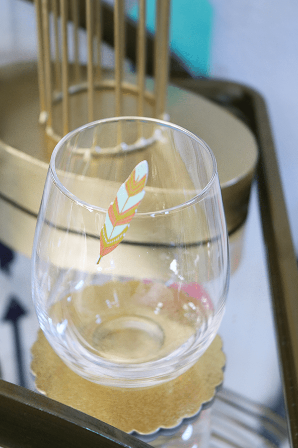 Painted Feather Clothespin on a stemless wine glass